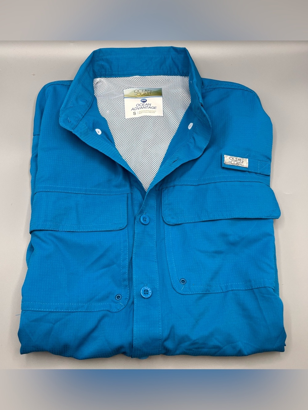 Ocean coast men’s fishing shirt size small long sleeve blue vented with pocket